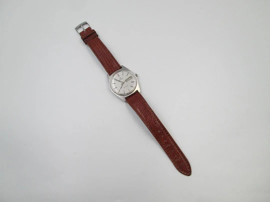 Omega Genève. Stainless steel. Automatic. Date & day. Leather strap. 1960's. Swiss