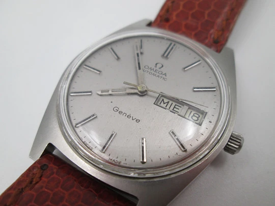 Omega Genève. Stainless steel. Automatic. Date & day. Leather strap. 1960's. Swiss