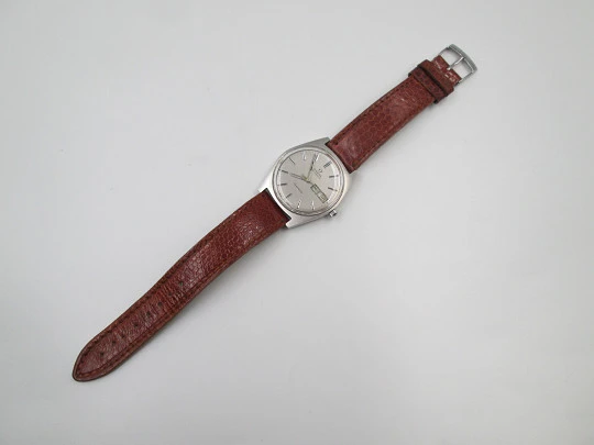 Omega Genève. Stainless steel. Automatic. Date & day. Leather strap. 1960's. Swiss