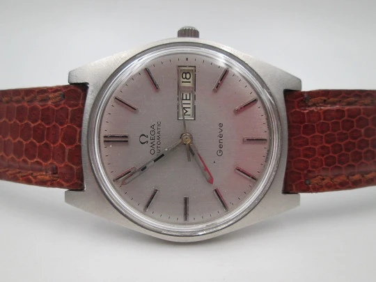 Omega Genève. Stainless steel. Automatic. Date & day. Leather strap. 1960's. Swiss