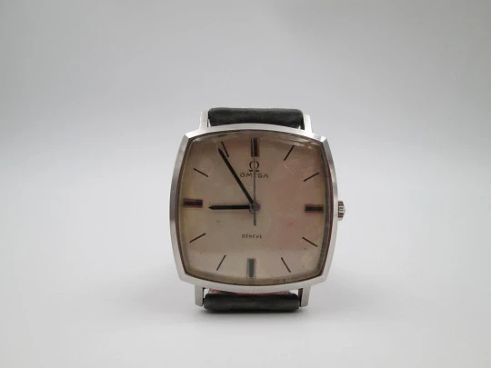 Omega Genève. Stainless steel. Manual wind. Grey dial. TV format. Leather strap. 1960's