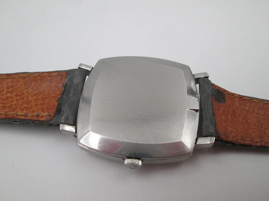 Omega Genève. Stainless steel. Manual wind. Grey dial. TV format. Leather strap. 1960's