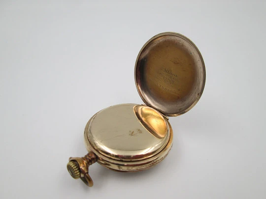 Omega open-faced pocket watch. Gold plated metal. Stem-wind. Porcelain dial. 1900's. Swiss