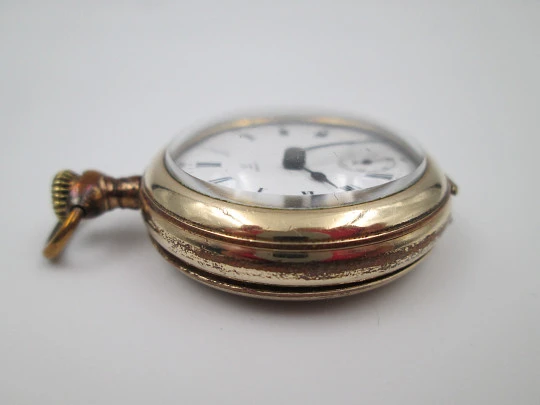 Omega open-faced pocket watch. Gold plated metal. Stem-wind. Porcelain dial. 1900's. Swiss