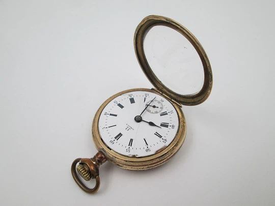 Omega open-faced pocket watch. Gold plated metal. Stem-wind. Porcelain dial. 1900's. Swiss