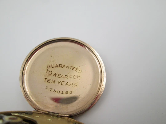 Omega open-faced pocket watch. Gold plated metal. Stem-wind. Porcelain dial. 1900's. Swiss