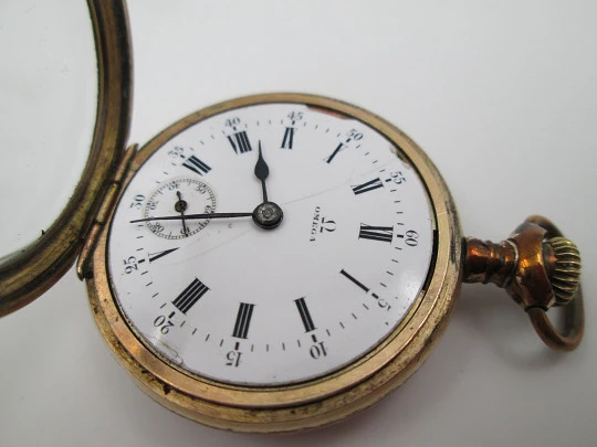 Omega open-faced pocket watch. Gold plated metal. Stem-wind. Porcelain dial. 1900's. Swiss