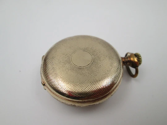 Omega open-faced pocket watch. Gold plated metal. Stem-wind. Porcelain dial. 1900's. Swiss