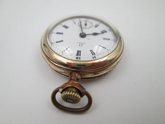 Omega open-faced pocket watch. Gold plated metal. Stem-wind. Porcelain dial. 1900's. Swiss