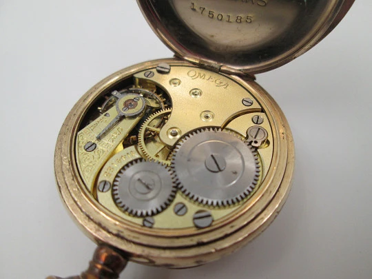 Omega open-faced pocket watch. Gold plated metal. Stem-wind. Porcelain dial. 1900's. Swiss