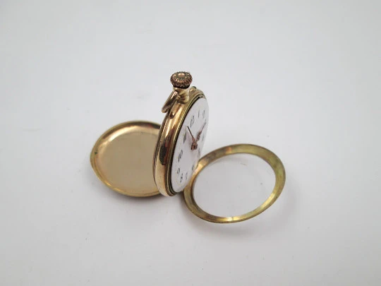 Open-face pocket watch. 14k yellow gold. and blue enamel. Stem-wind. Swiss. 1920's