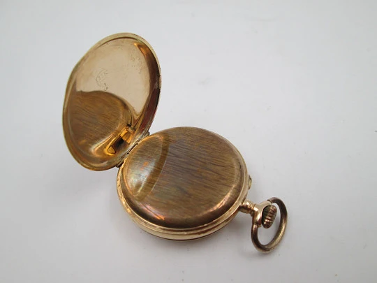 Open-face pocket watch. 14k yellow gold. and blue enamel. Stem-wind. Swiss. 1920's