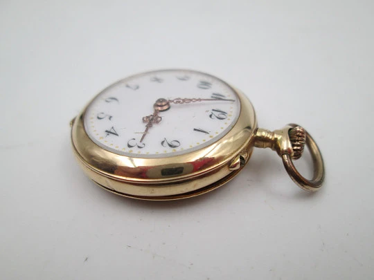 Open-face pocket watch. 14k yellow gold. and blue enamel. Stem-wind. Swiss. 1920's