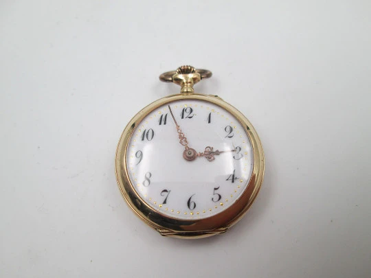 Open-face pocket watch. 14k yellow gold. and blue enamel. Stem-wind. Swiss. 1920's