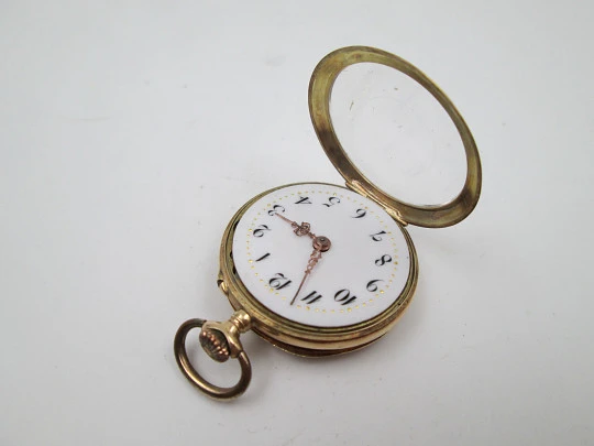 Open-face pocket watch. 14k yellow gold. and blue enamel. Stem-wind. Swiss. 1920's