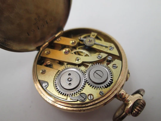 Open-face pocket watch. 14k yellow gold. and blue enamel. Stem-wind. Swiss. 1920's