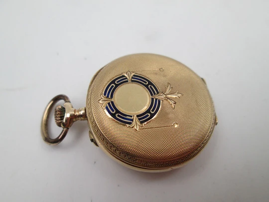 Open-face pocket watch. 14k yellow gold. and blue enamel. Stem-wind. Swiss. 1920's