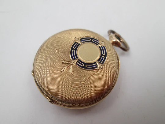 Open-face pocket watch. 14k yellow gold. and blue enamel. Stem-wind. Swiss. 1920's