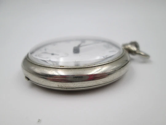 Open-face pocket watch. Silver plated metal. Porcelain dial. Stem-wind. Europe. 1920's