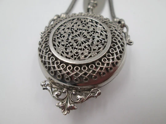 Openwork chatelaine with three bodies. Silver plated. Belt hook and pocket watch holder