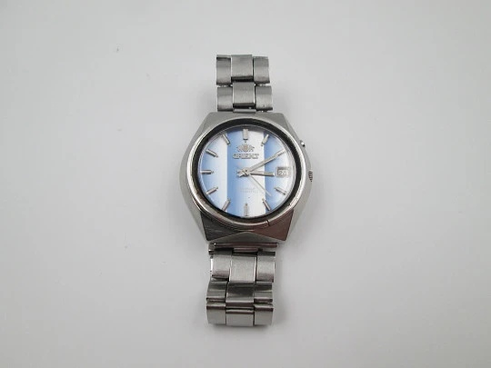 Orient. Acero inoxidable. Cuerda automática. Calendario. Brazalete. Estuche. Japón. 1980