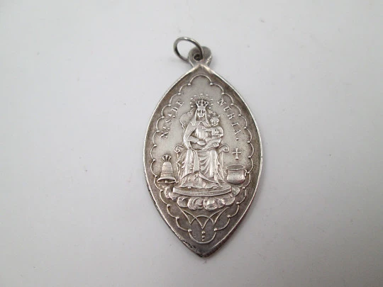 Our Lady of Nuria (Queralbs) and San Gil sterling silver medal. Ring on top. Spain. 1890's