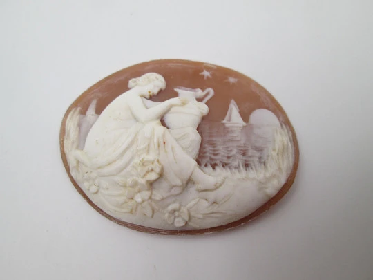 Oval shell cameo. Nymph with amphora in seascape. High relief work. Europe. 1940's