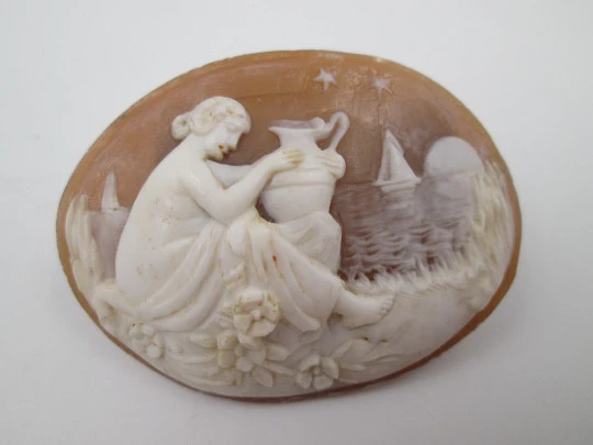 Oval shell cameo. Nymph with amphora in seascape. High relief work. Europe. 1940's