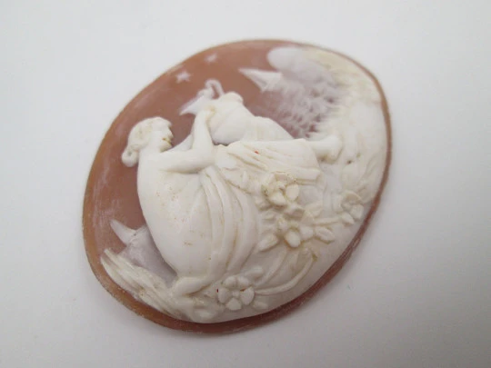 Oval shell cameo. Nymph with amphora in seascape. High relief work. Europe. 1940's