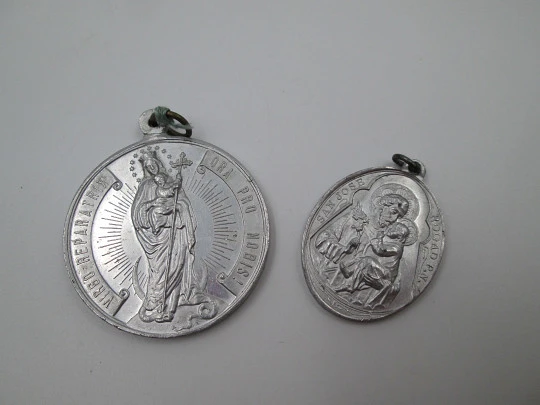 Pair of aluminum religious medals. Saint Joseph and Immaculate Conception. 1950's