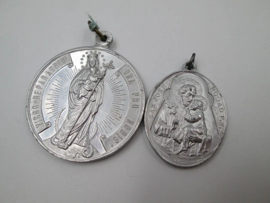 Pair of aluminum religious medals. Saint Joseph and Immaculate Conception. 1950's