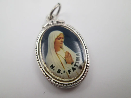 Pair of medals. Silver plated metal. Immaculate Conception and Virgin Fatima