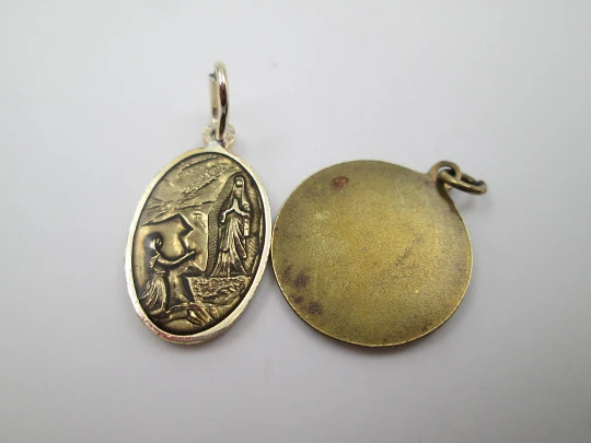 Pair of religious medals. Gold plated metal and blue enamel. Virgin Mary. Spain. 1970's