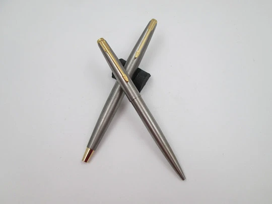 Parker 45 Flighter fountain pen and ballpoint set. Stainless steel & gold plated details. Box