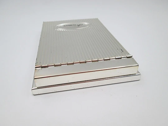 Parker desk notebook. Silver plated metal. Articulated lid. Vertical line motifs. 2010's