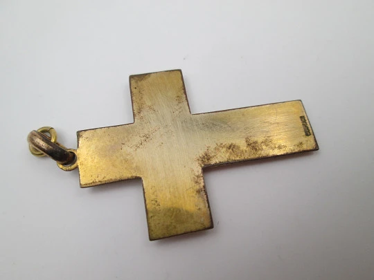 Pendant cross with christian symbols. Gold plated metal. Handle and ring. Spain. 1950's