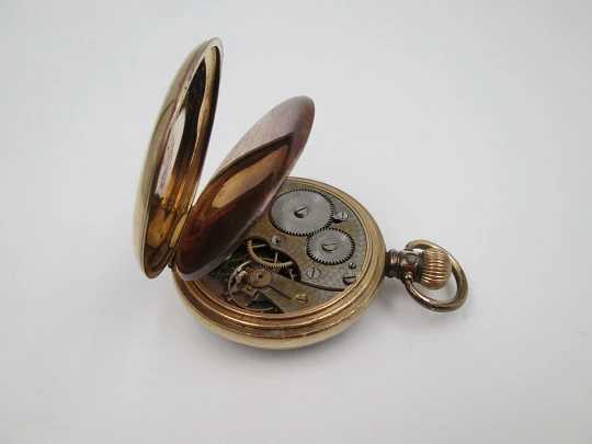 Pinnacle open-face pocket watch. Gold plated metal. Stem winding. England / Swiss. 1930's