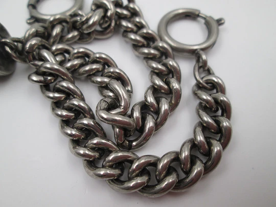 Pocket watch curb link chain. Silver plated metal. Horn pendant. Spring ring clasp. 1940's