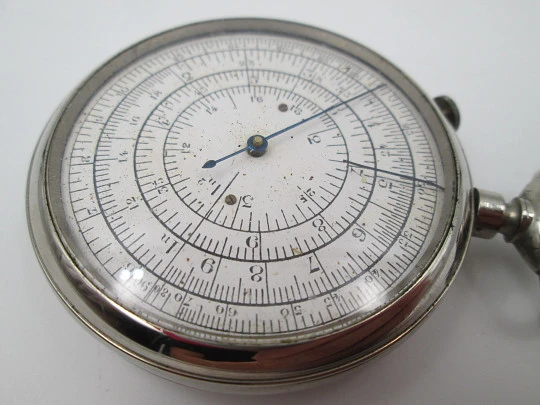 Pocket watch slide rule Calculigraphe. HC París. Silver plated metal. 1900's