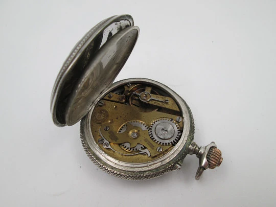 Regulador D.G. hunter-case pocket watch. Sterling silver. Castilla y Leon shield. 1910's