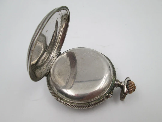 Regulador D.G. hunter-case pocket watch. Sterling silver. Castilla y Leon shield. 1910's