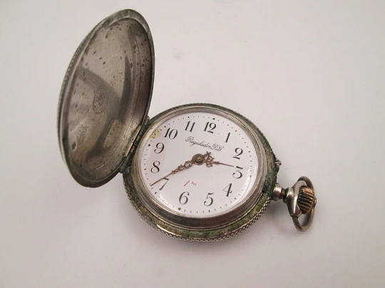 Regulador D.G. hunter-case pocket watch. Sterling silver. Castilla y Leon shield. 1910's