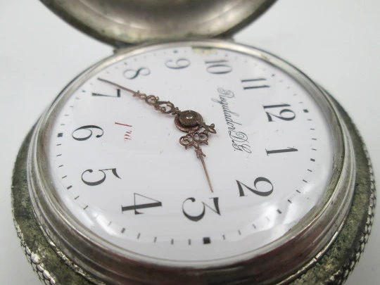 Regulador D.G. hunter-case pocket watch. Sterling silver. Castilla y Leon shield. 1910's