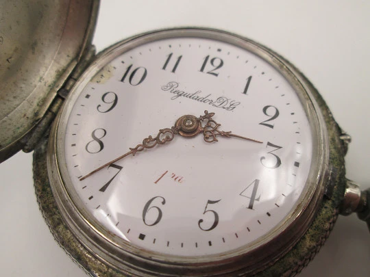 Regulador D.G. hunter-case pocket watch. Sterling silver. Castilla y Leon shield. 1910's