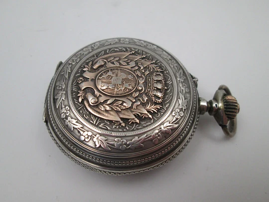 Regulador D.G. hunter-case pocket watch. Sterling silver. Castilla y Leon shield. 1910's