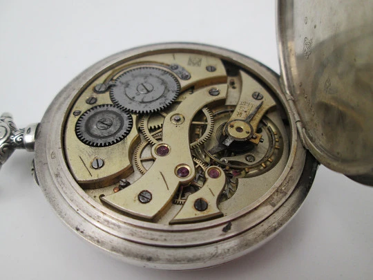 Reloj bolsillo H. Moser & Cie. Plata de ley. Cuerda remontoir. Tapas decoradas, 1880