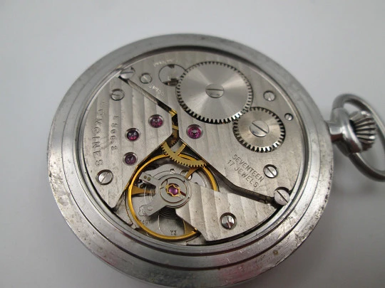 Reloj bolsillo Longines. Acero cromado. Cuerda manual. Estuche de madera. Suiza. 1960