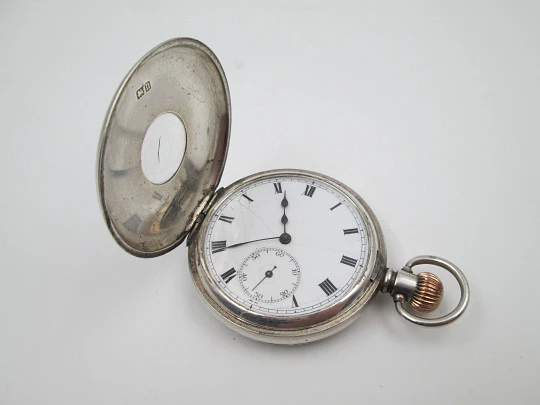 Reloj bolsillo media saboneta Dennison. Plata de ley. Pequeño segundero. 1890. Inglaterra