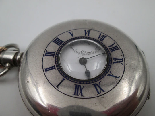 Reloj bolsillo media saboneta Dennison. Plata de ley. Pequeño segundero. 1890. Inglaterra