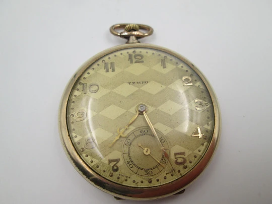 Reloj de bolsillo art decó Tempo. Laminado en oro 14k. Cuerda manual. Suiza. 1930